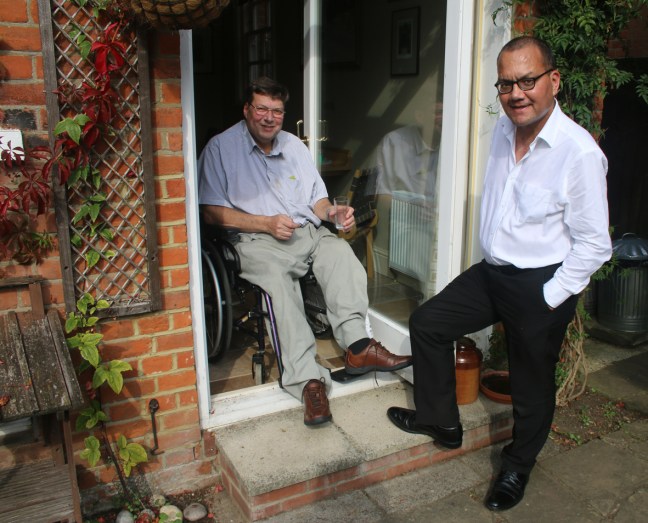 people at a french window