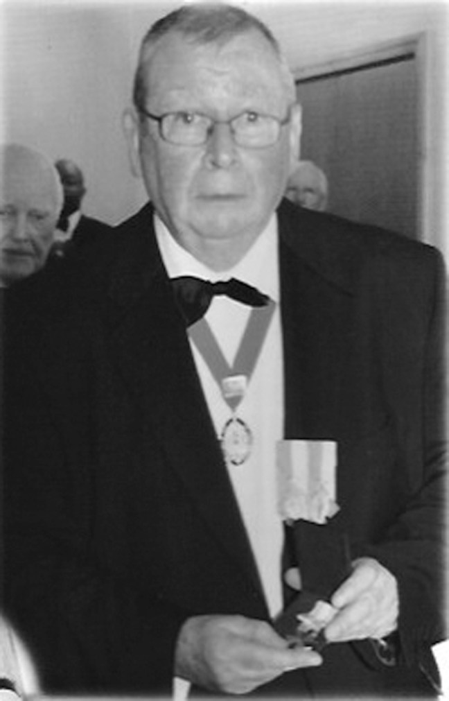William Gallagher proudly holds the new medal, the Columba Cross