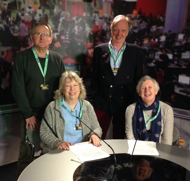 brothers and their wives pictured in the News studio